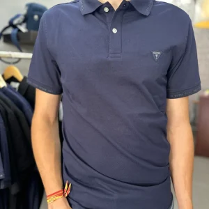 Polo Guess marino con logo en cuello y mangas