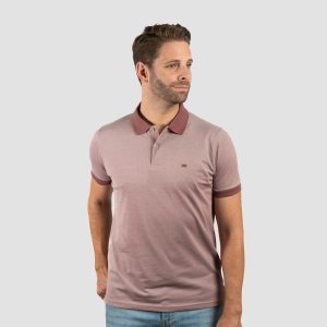 Polo tejido oxford con bolsillo.