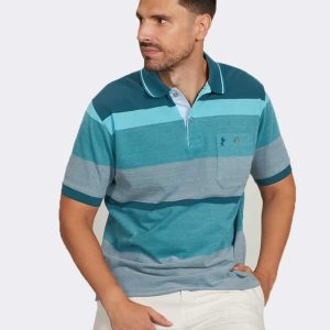 Polo manga corta con bolsillos de hombre punto piqué a franjas desiguales a tonos azules